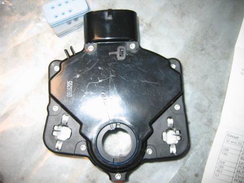 1992 Ford Bronco - A black plastic neutral safety switch / manual lever position (MLP) sensor for an automatic transmission, showing the molded part number 09…