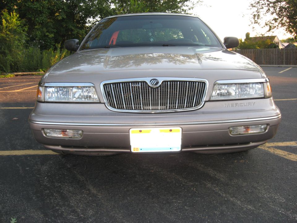 Tan 1995 Mercury Grand Marquis front view with chrome grille