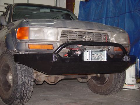 1993 Ford Bronco - Front view of a 1993 Toyota Land Cruiser an aftermarket bumper and winch.