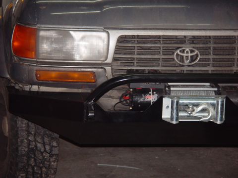 1993 Ford Bronco - This vehicle features an aftermarket bumper and winch, not original equipment.