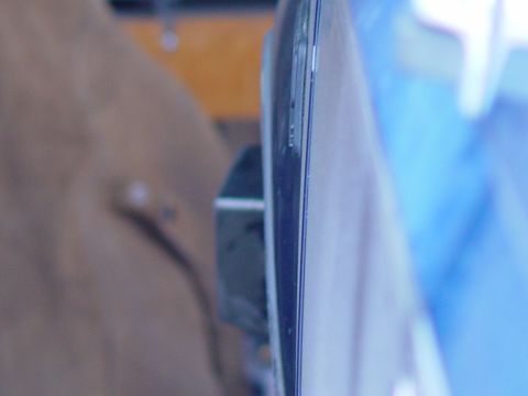 1993 Ford Bronco - Detail shot of the interior trim and window frame of a vehicle.