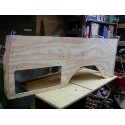 1989 Ford Bronco - A custom-made wooden panel, likely for a vehicle's interior, is shown in a workshop setting.