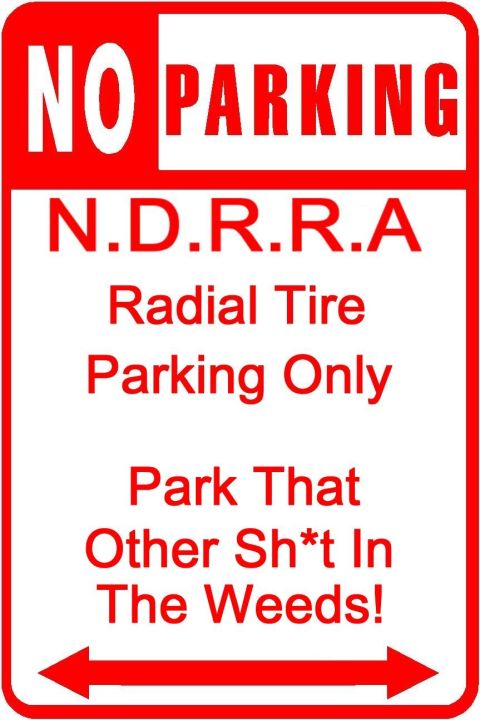 1992 Ford Mustang - This sign indicates restricted parking and has a humorous, albeit vulgar, message.
