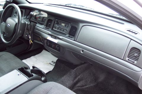 2001 Ford Crown Victoria - Interior view of a 2001 Ford Crown Victoria, showing the dashboard and driver's side.