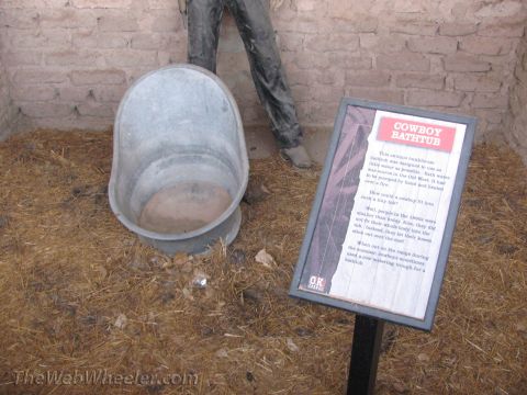 1996 Ford C-350 (Centurion Conversions) - A display shows a cowboy bathtub with a sign explaining its use in the Old West.