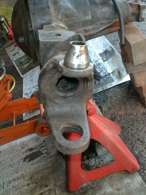 1990 Ford Bronco - Driver's Kingpin was destroyed. Note busted bottom dust cap