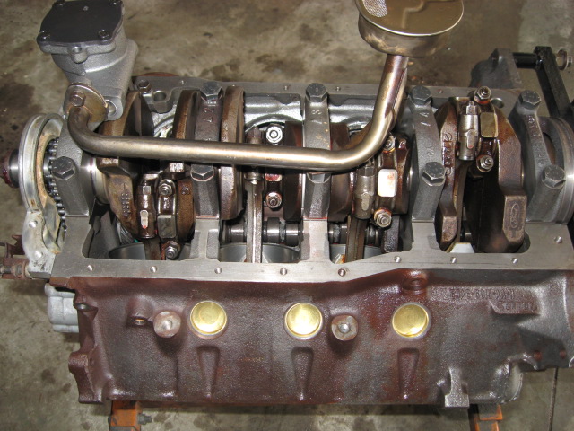 Back from friend's HD parts washing machine. New cam bearings, hone'd, new Clevite 77 rings & TRW bearings. Everything measured up within std...
Brass freeze plugs, new oil pump, and yes, I use a gasket between the pump & block...you should too.