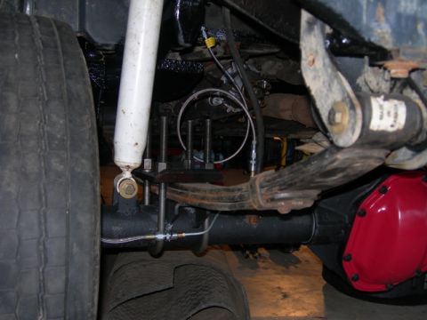 1991 Jeep Wrangler - This photo shows the rear suspension and axle of a Jeep, likely undergoing modifications.