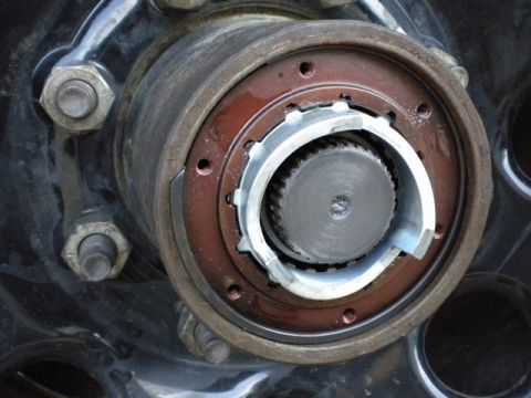 1989 Ford Bronco - Detail of a vehicle's manual locking hub, showing the internal splined mechanism.