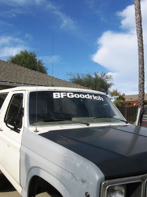 1986 Ford Bronco - Front view of a Ford Bronco, likely from the 1980s, a BFGoodrich banner.