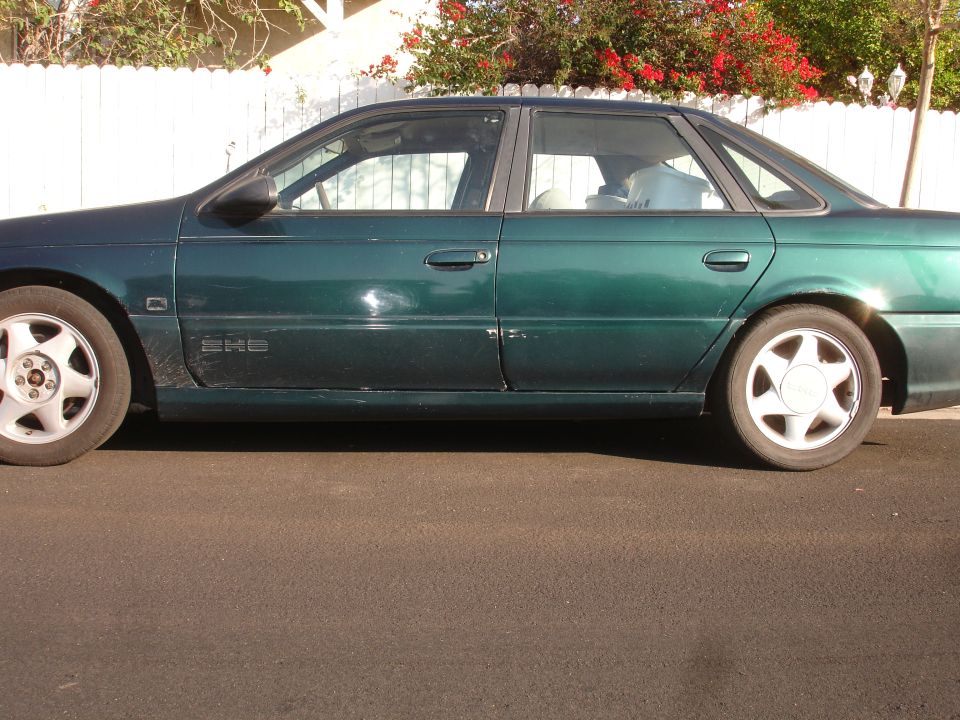 Green 1995 Ford Taurus SHO side view