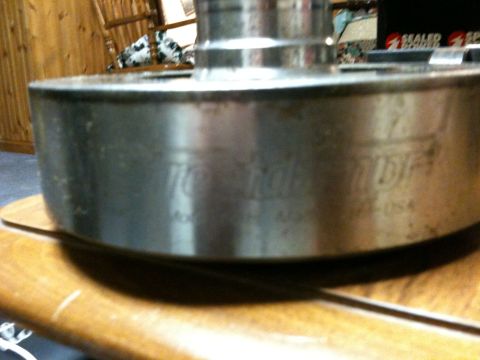 1972 Ford Ranchero - Close-up of a metal component, possibly a differential housing, with "Ford" and "Tuff Diff" stamped into its surface.