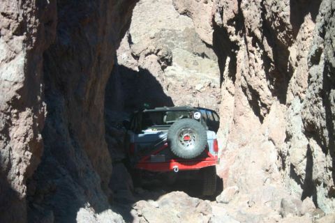 1991 Ford Bronco - This 1991 Ford Bronco navigates a tight passage through a rocky canyon.