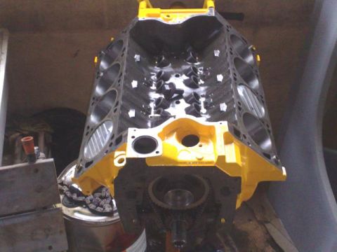 1978 Ford Bronco - A yellow engine block is shown, likely during a rebuild or restoration process.