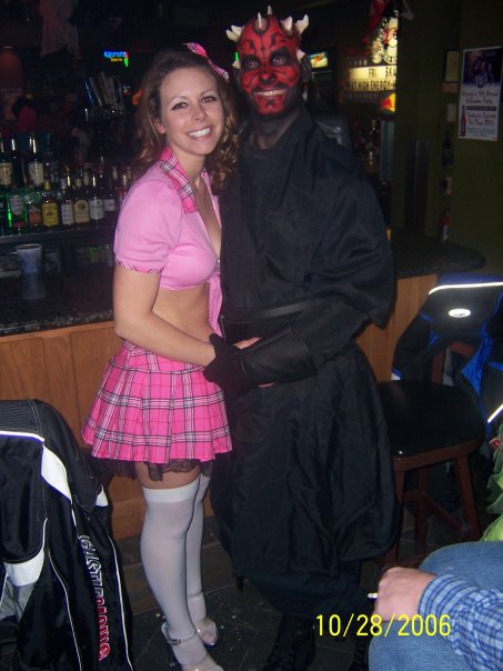 1995 Ford Probe - Two people in costumes pose for a photo at a bar on October 28, 2006.
