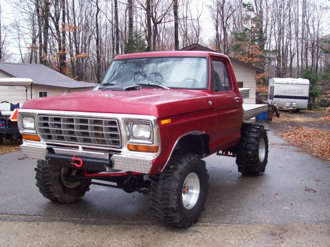 1978 Ford F-150 - This modified 1978 Ford F-150 features oversized off-road tires and a flatbed conversion.