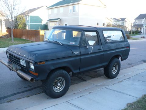1979 Ford Bronco - This 1979 Ford Bronco is seen from a 3/4 front angle, parked on a residential street.