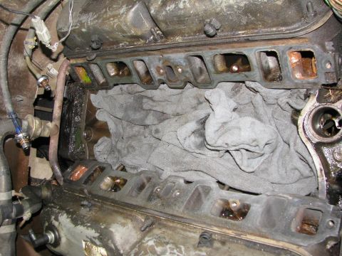 1986 Ford Bronco - after cleaning gasket surfaces, removed valve covers and replaced those gaskets as well.
