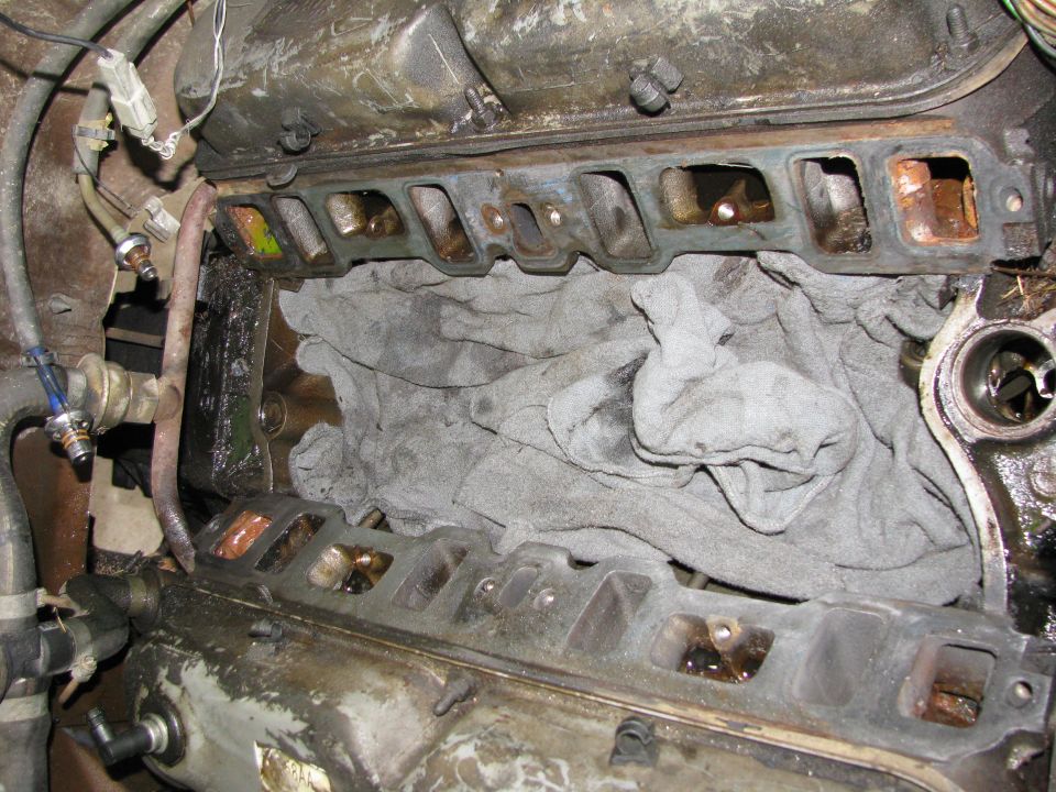 after cleaning gasket surfaces, removed valve covers and replaced those gaskets as well.