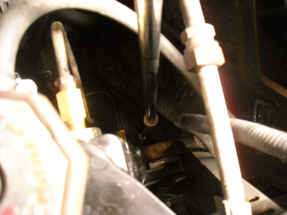 I used a few extensions to get to that lower radiator hose clamp.
As a footnote, I used a reducing adapter for the smaller socket. Most of my tools are Craftsman but somewhere, I picked up this really crappy Chinese set. The lack of quality showed and before the end of this project, the adapter had broken.