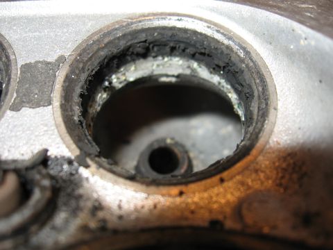 1991 Mitsubishi 3000GT - This is a close-up view of a worn valve seat within an engine cylinder head.