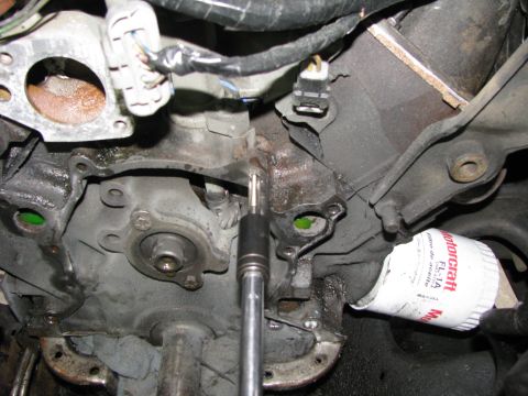 1986 Ford Bronco - now to chase all the threads. once that was done i sprayed carb cleaner to get rid of all the debris from the gasket removal. and a final s…