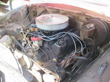 1979 Ford F-250 - Close-up view of the engine compartment, showing the V8 engine and associated components.