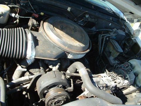 1994 GMC Suburban - Just the other side. Runs beautifully, smooth idle and starts with no problem. Someone cared about it, the wires don't look to be that old