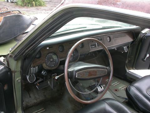 1968 Mercury Cougar - Interior view of a 1968 Mercury Cougar, its distinctive dashboard and steering wheel.