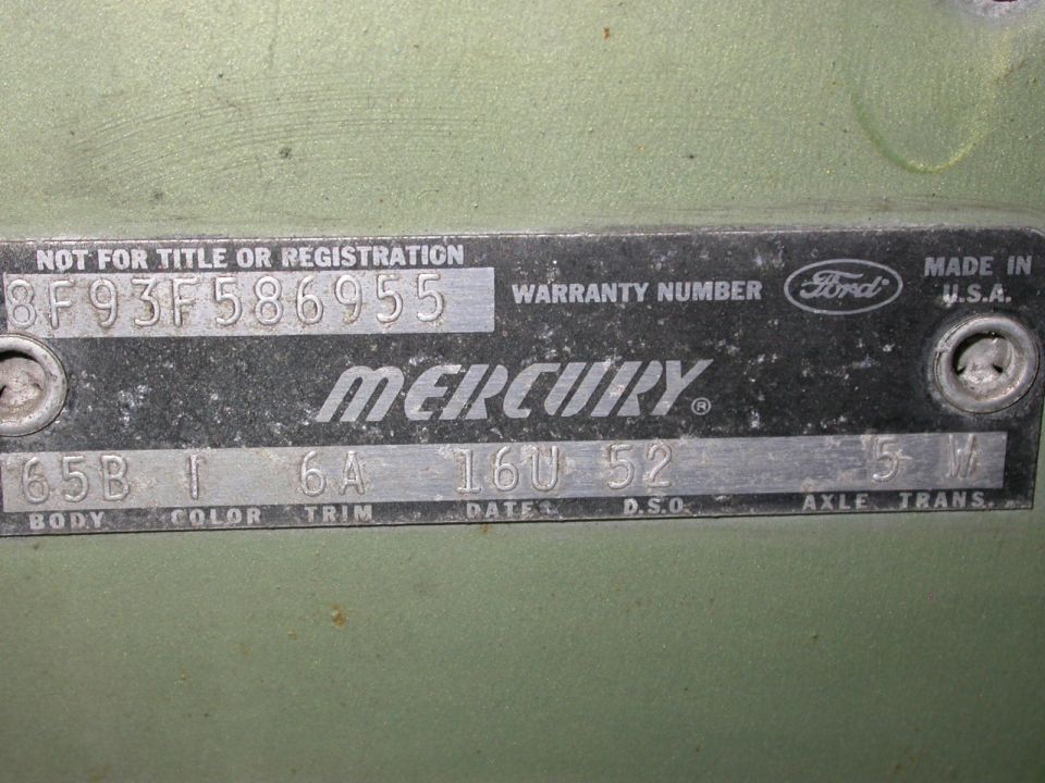 Mercury warranty plate 8F93F586955 with body 65B, color I, trim 6A, date 16U, DSO 52, axle 5, trans M