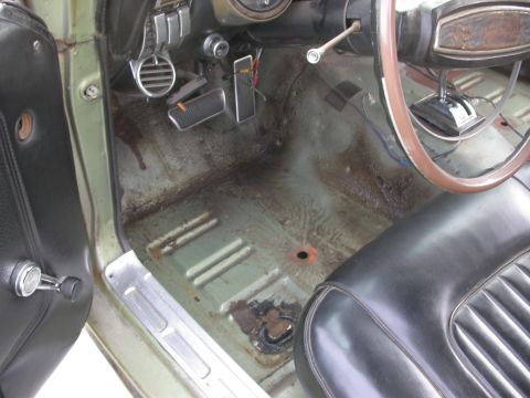 1968 Mercury Cougar - Interior view of a 1968 Mercury Cougar, highlighting the driver's side floor and seat.