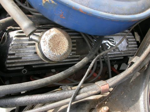 1968 Mercury Cougar - Engine detail shot showing a valve cover with some text and a blue air cleaner housing.