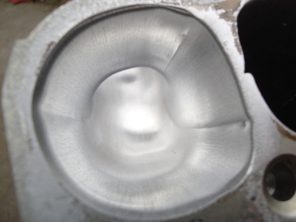 Close-up of a polished engine cylinder head intake port