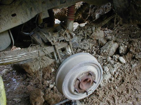 1983 Ford Bronco - The missing lift block & shim were found a few feet downhill.