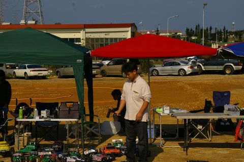 1986 Ford Bronco - Outdoor event with multiple tents displaying remote control cars and other items.