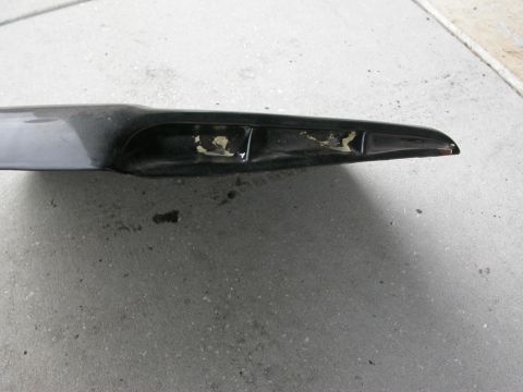 1968 Mercury Cougar - The paint is peeling off this car spoiler, revealing the underlying material.