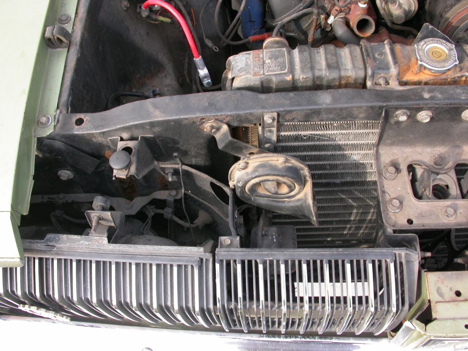 1968 Mercury Cougar engine bay with grille and radiator