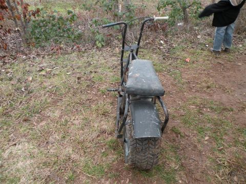 1901 Ford Bronco - This mini bike is shown from the rear, a worn seat and thick tires, suggesting it is a project vehicle.