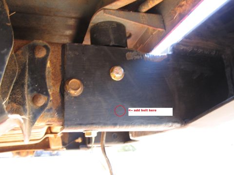 1995 Ford F-150 - Annotation points to a location on the truck frame for adding a bolt.