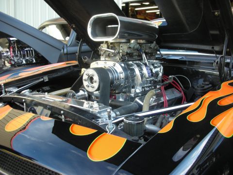 1992 Ford Crown Victoria - Custom V8 engine with blower and flame graphics, seen at a car meet.