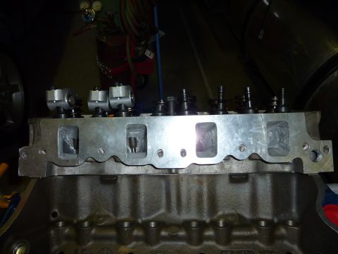 1971 Ford Mustang - Engine cylinder head assembly with rocker arms, ready for installation onto the engine block.