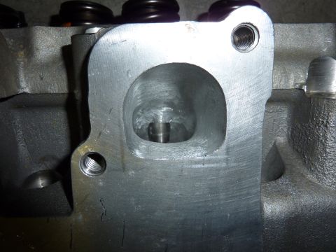 1971 Ford Mustang - Engine cylinder head showing a port and valve stem, likely from a performance build.