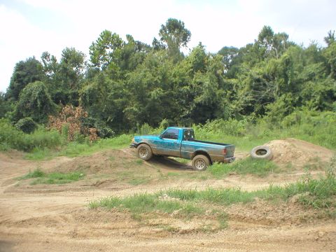 1983 Ford Bronco - He made it over the jump using inertia, but I had to pull him out.