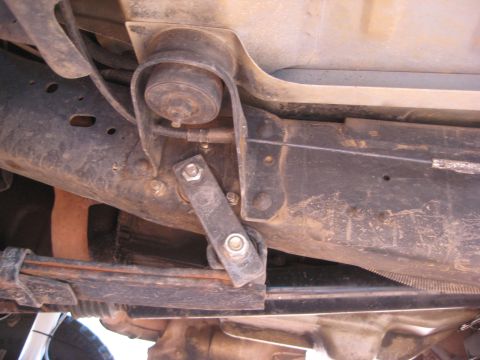 1996 Ford Bronco - Close-up view of the undercarriage, showing suspension parts and frame structure.