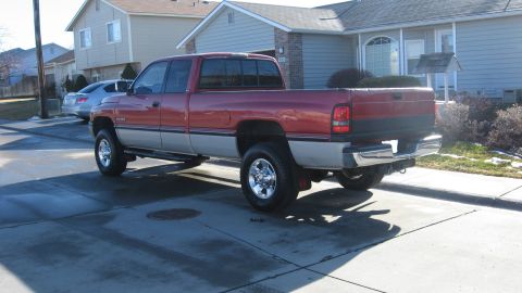 1997 Dodge 2500 - This 1997 Dodge 2500 pickup truck features a two-tone red and silver paint scheme.