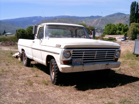 1988 Ford Bronco - This 1967 Ford F-series pickup truck is seen from the front, with a license plate reading A453780.