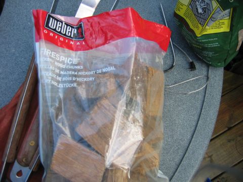 1992 Ford Bronco - Weber Firespice hickory wood chunks in a plastic bag with grilling tools.