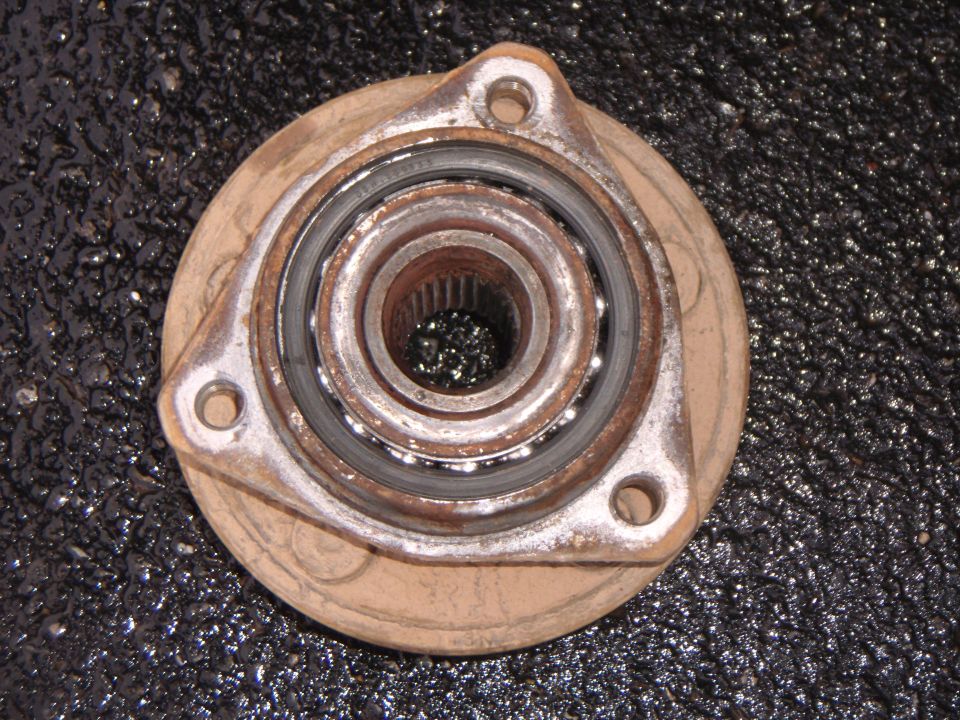 Wheel hub assembly with bearing, splined center, and mounting holes