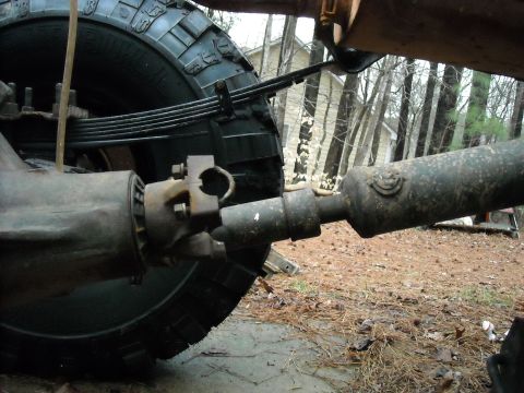 1979 Ford F-150 - This image shows the rear axle, driveshaft, and suspension components of a vehicle.