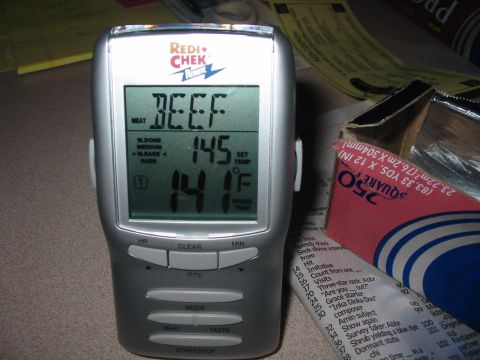 1992 Ford Bronco - Digital meat thermometer shows current and set temperatures for beef.